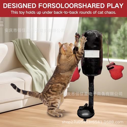 Interactive cat wand toy with black holder, red plush teaser pouches, suction base