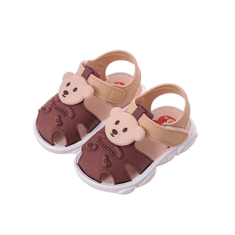 Kids bear sandals, dark brown and tan uppers, white sole, hook-and-loop strap, bear head patch