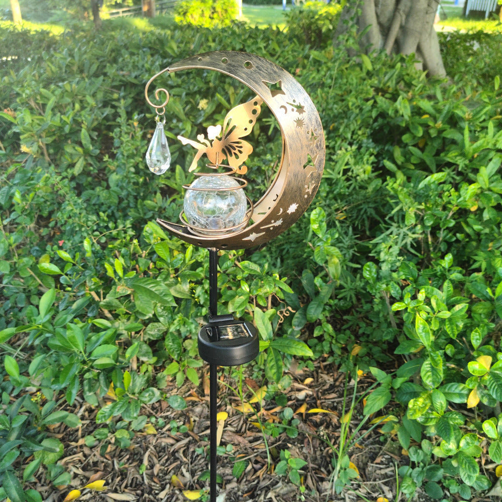 Solar moon garden lamp on stake with clear glass globe and butterfly fairy