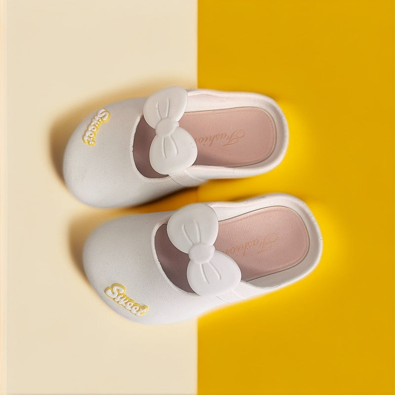 Girls' indoor slippers with bow, light gray upper with gold “Princess” script detail