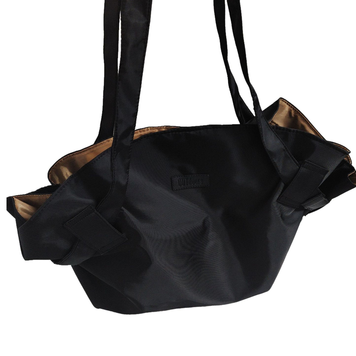 Black travel duffel bag with side tabs and visible interior lining at opening