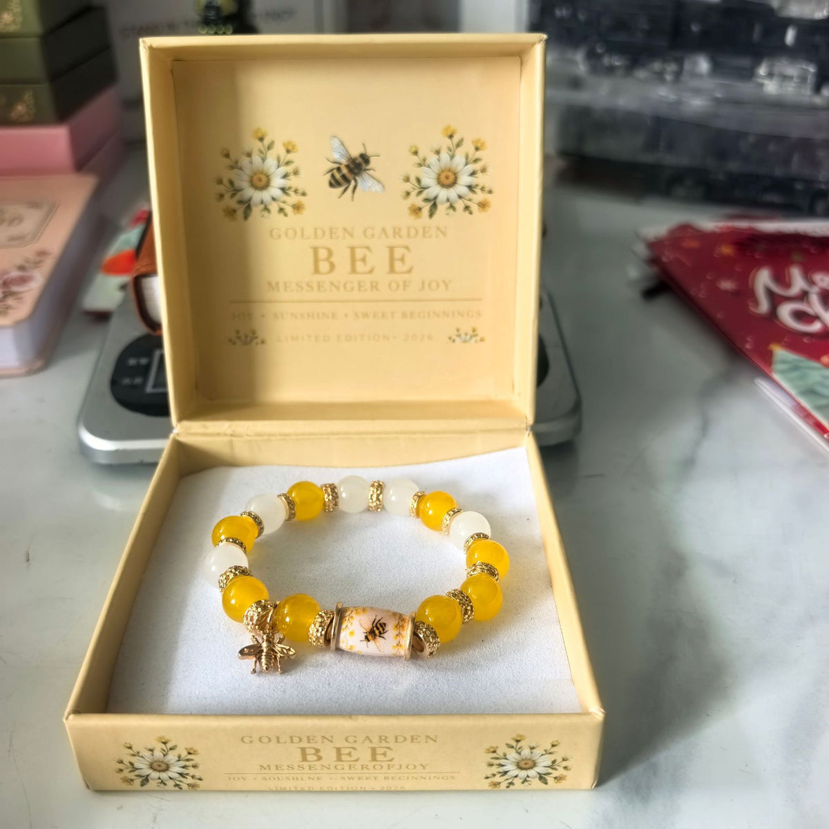 Gold and honey-bee beaded elastic bracelet with yellow beads and small bee charms