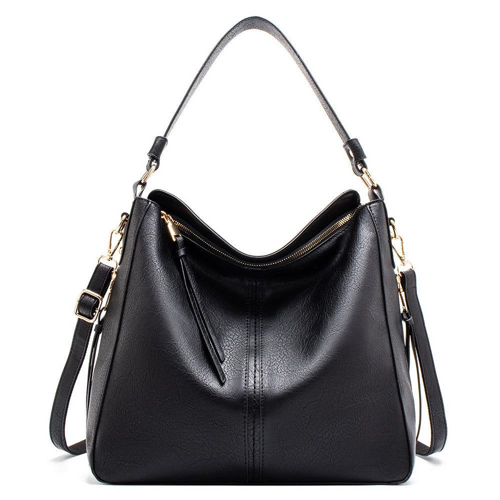 Black PU leather hobo crossbody bag with wide top opening and front zip pocket