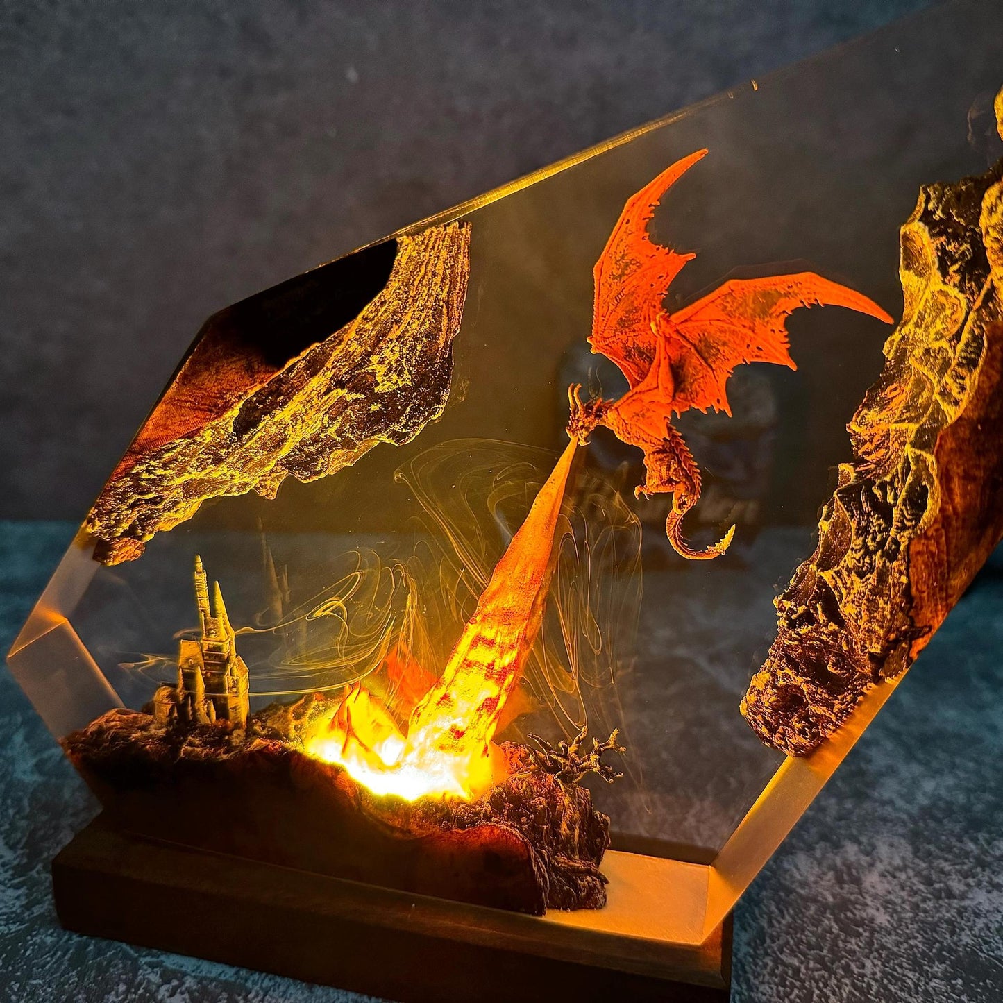 Fire dragon resin art lamp close-up, fiery dragon details in clear angled enclosure