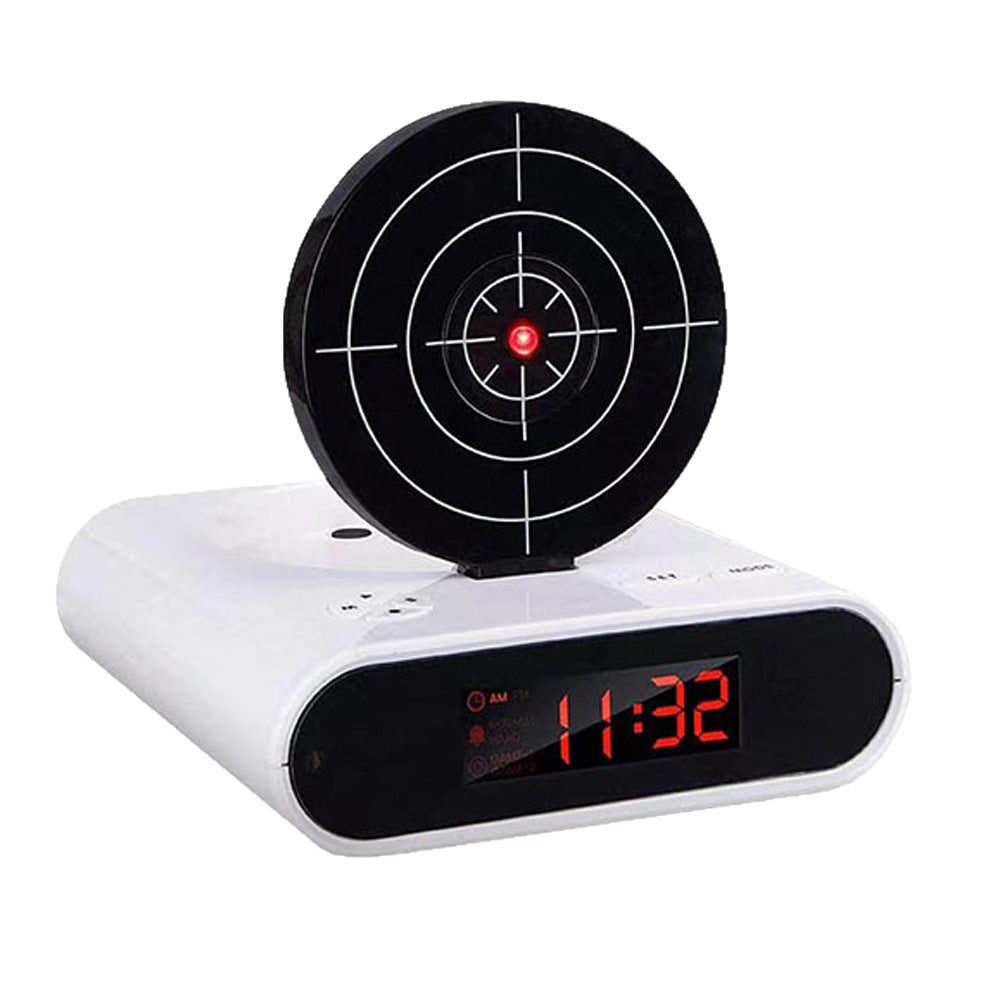 White target-themed alarm clock with circular crosshair dial and red LED time reading 1:32 AM.