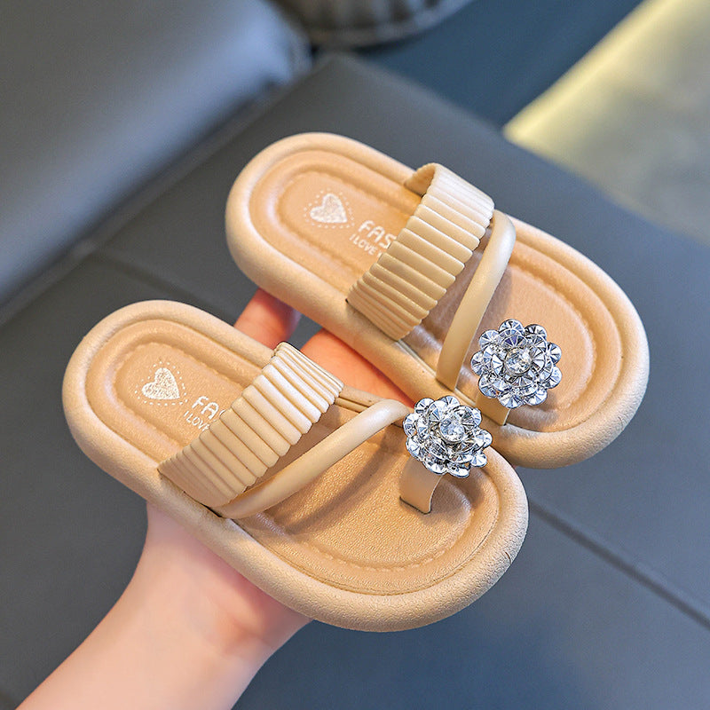 Beige girls' flip-flops with rhinestone flower straps and soft cushioned sole