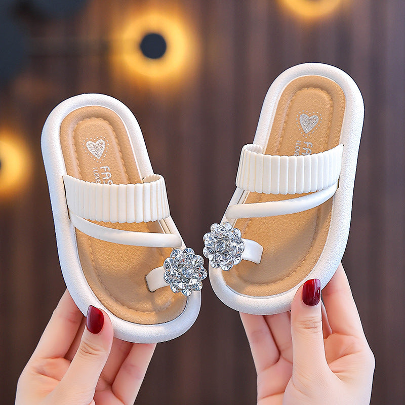 Girls' flip-flop slippers in white with heart logo and rhinestone flower on strap