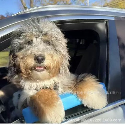 Dog car window chin rest, bright blue bar with dog resting chin and paws