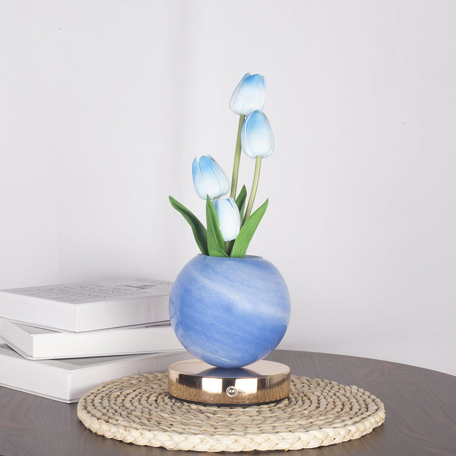 LED tulip night light with glowing blue tulips in blue spherical pot on round base