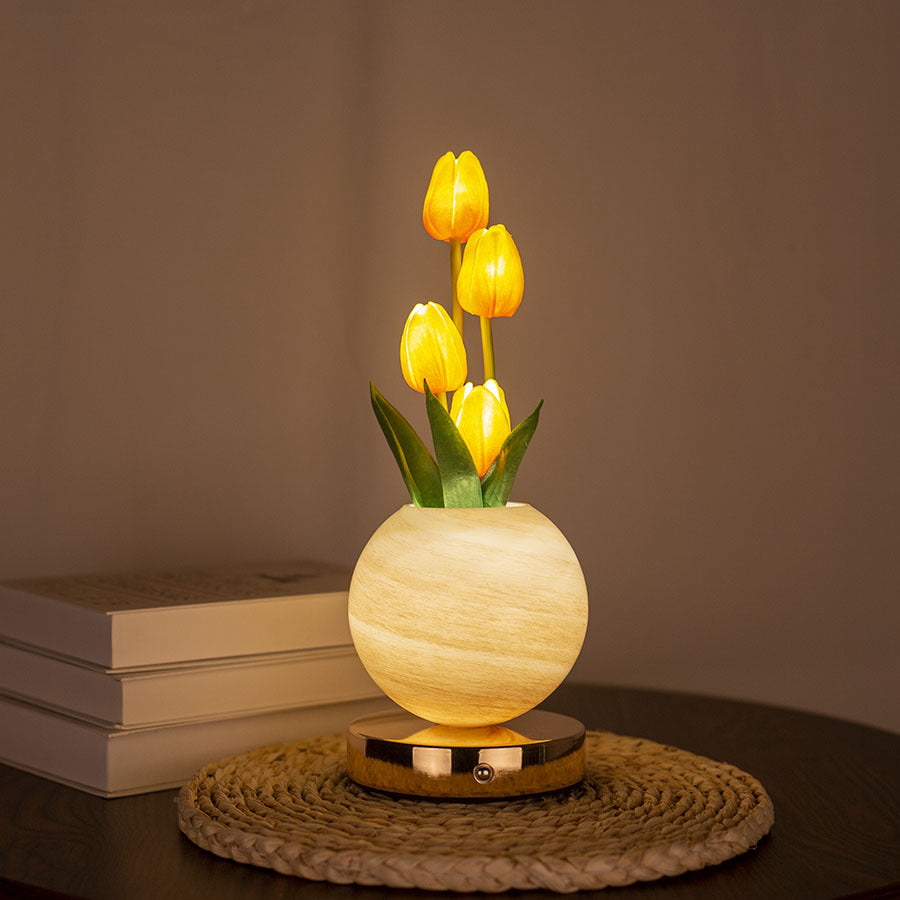 LED tulip night light with glowing yellow tulips in light wood tone pot