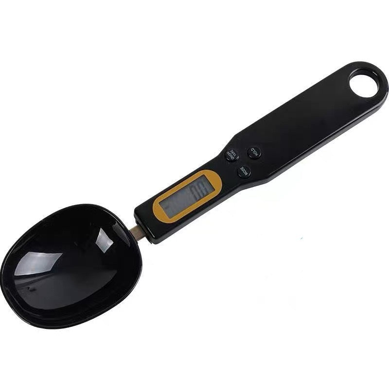 Black digital weighing spoon scale with LCD display and control buttons