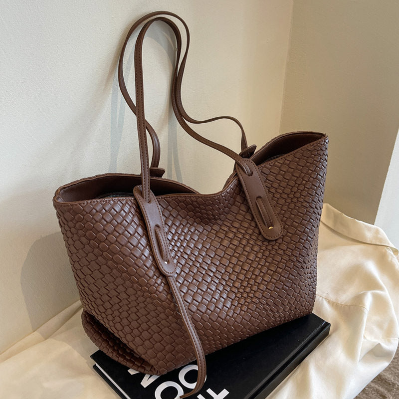 Woven PU tote bag in dark brown with double top handles and long shoulder strap