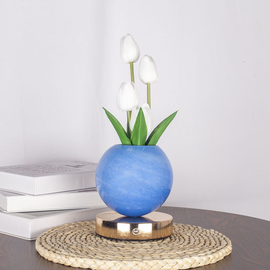 LED tulip night light with glowing white tulips in blue spherical pot on round base