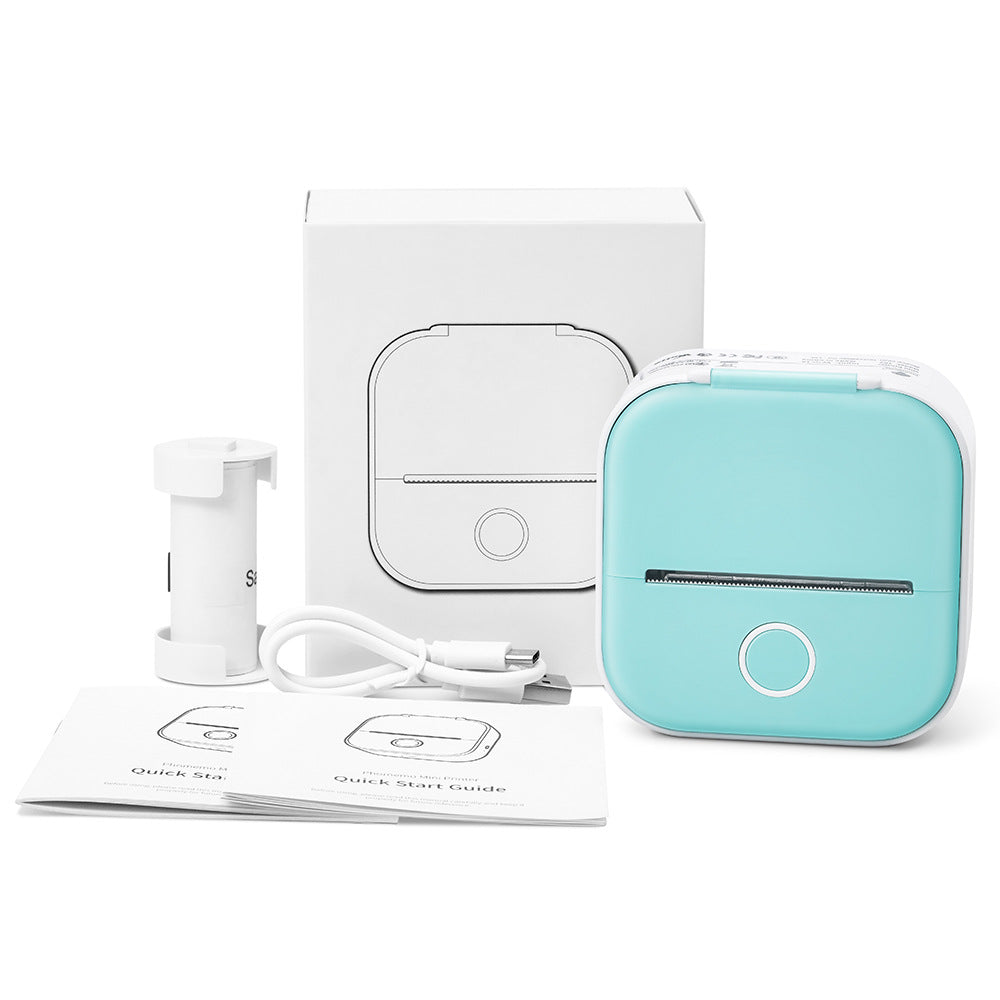Teal mini thermal label printer kit with box, cables, and thermal paper rolls