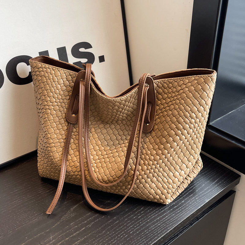 Woven PU shoulder tote bag in tan/beige with two handles and braided-look woven texture