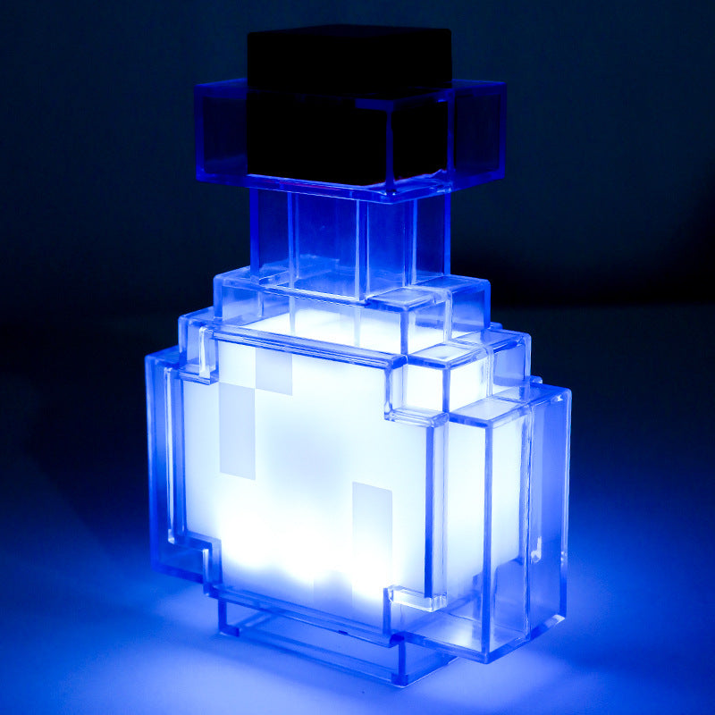 Blue translucent Minecraft-style cube night light with glowing white interior