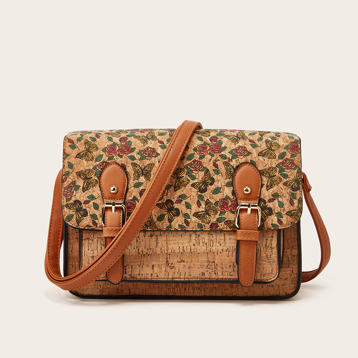 Women’s crossbody bag with green rose print flap and brown leather buckles