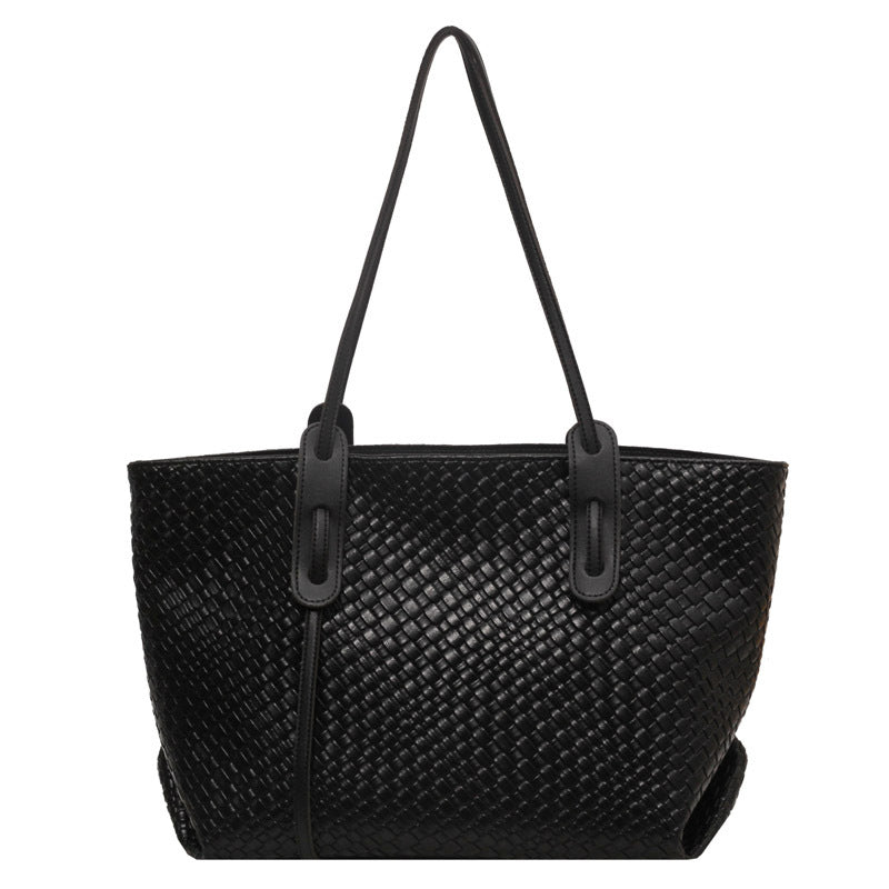 Woven PU tote bag in black with two top handles and rounded open top