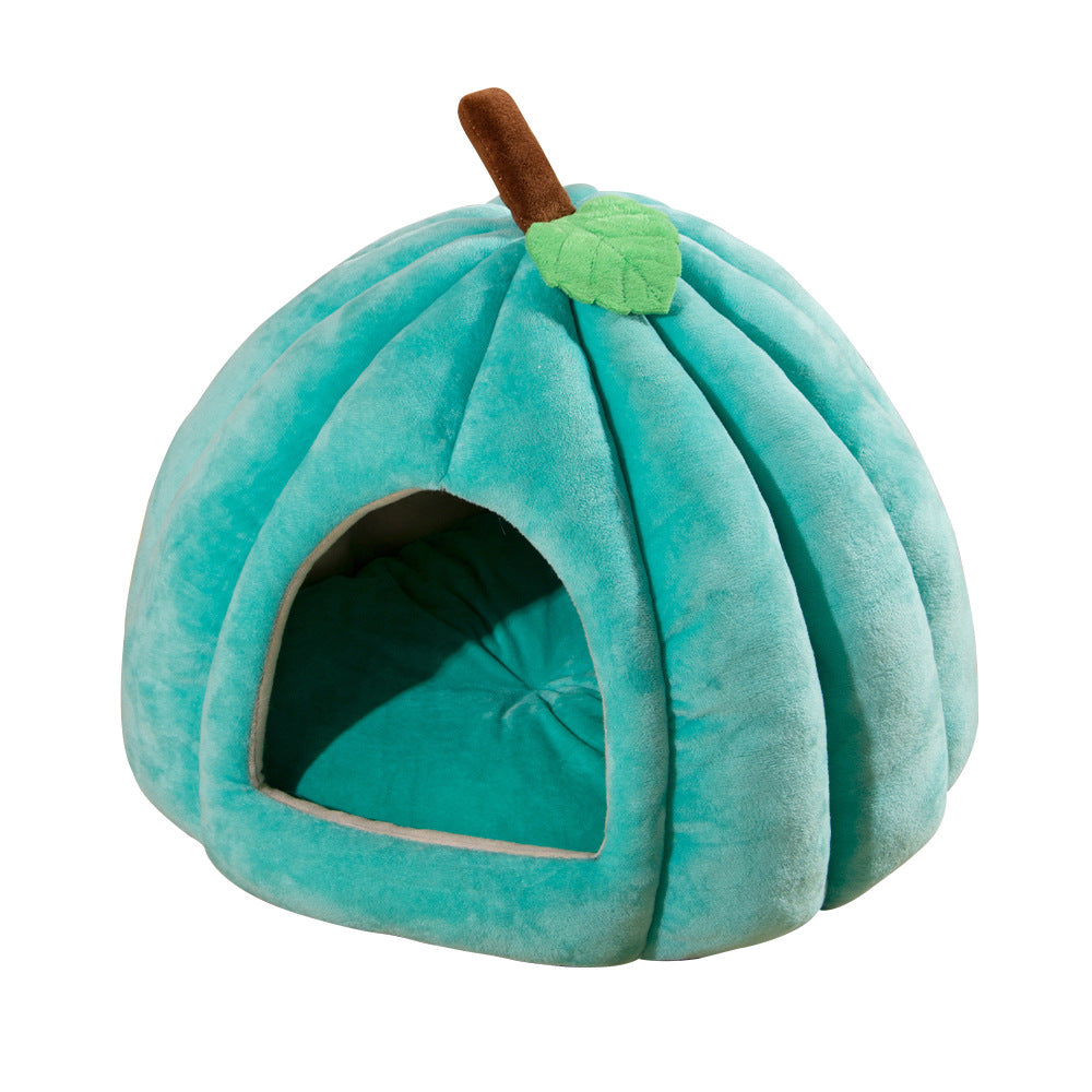 Teal plush semi-enclosed pet pumpkin cave bed with green leaf topper and front opening