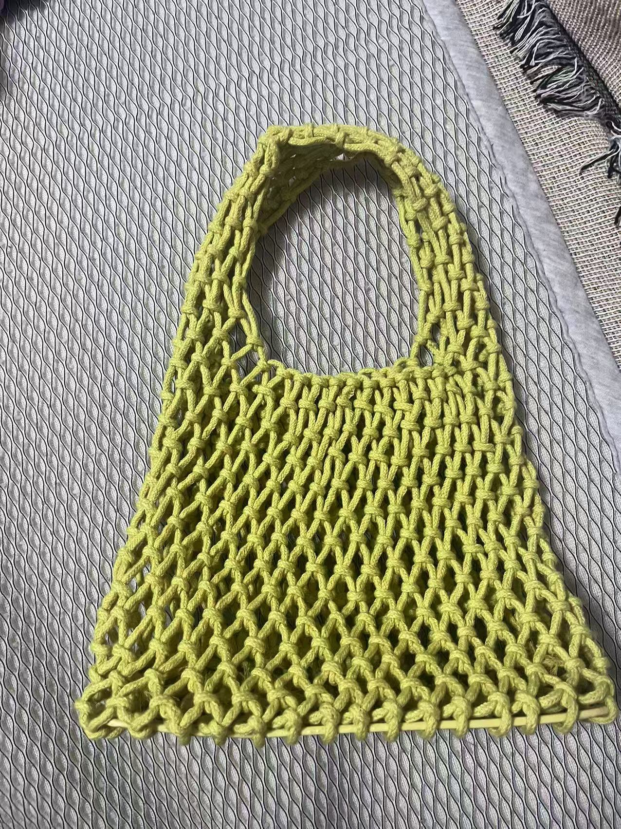 Lime green rope woven bucket bag with loop handle and openwork net pattern