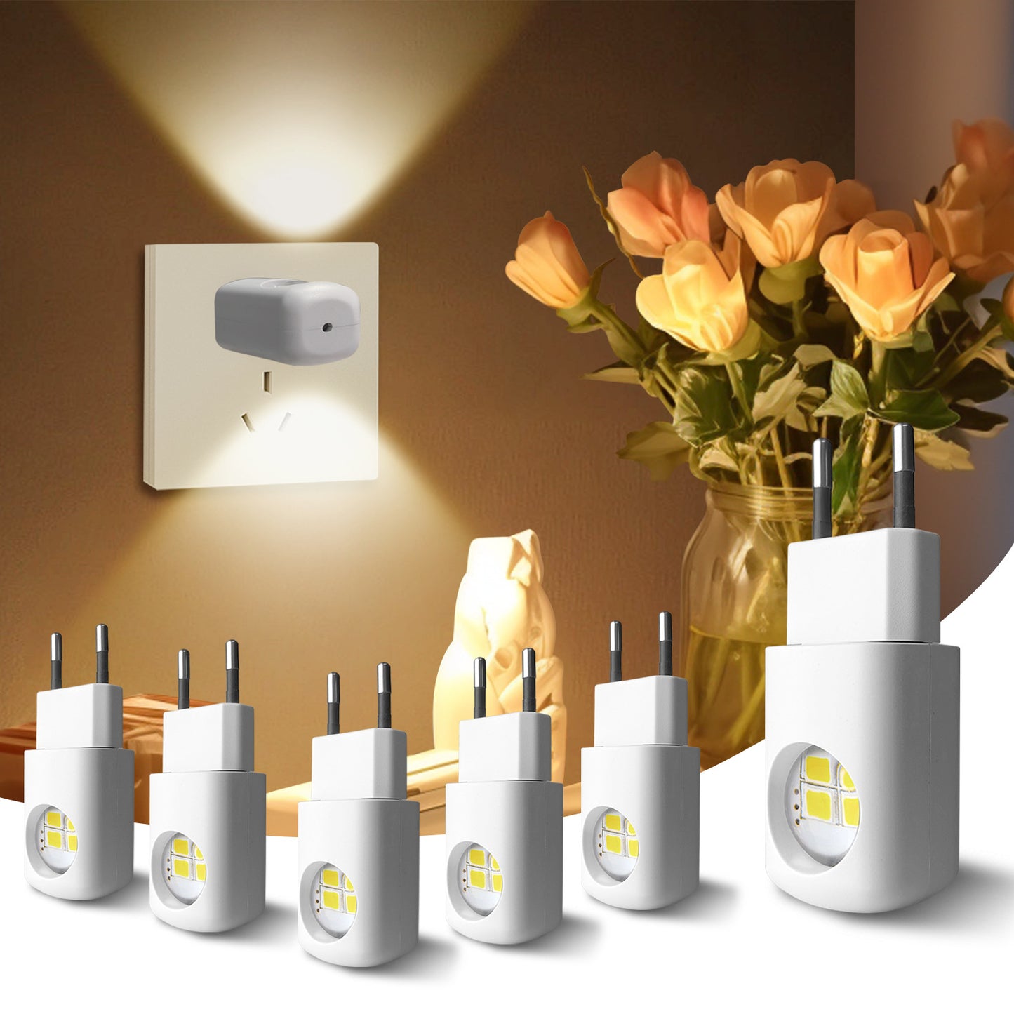 Group of white plug-in LED night lights with small pin prongs and warm glow