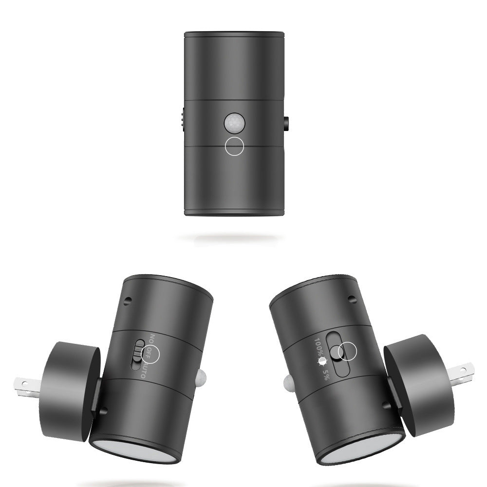 Black motion sensor LED night light with side outlet plug and rounded sensor face