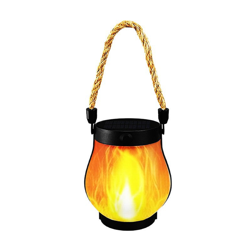 Solar rechargeable flame-effect lantern with amber flame glow, black base, hemp rope handle