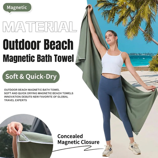 Olive quick-dry microfibre beach towel, folded and held for use