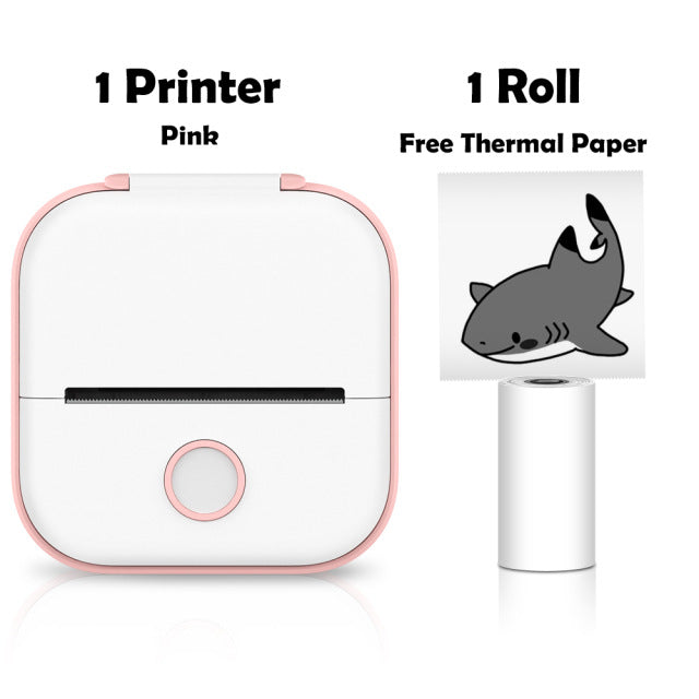 Pink mini thermal label printer front view with a free roll of thermal paper