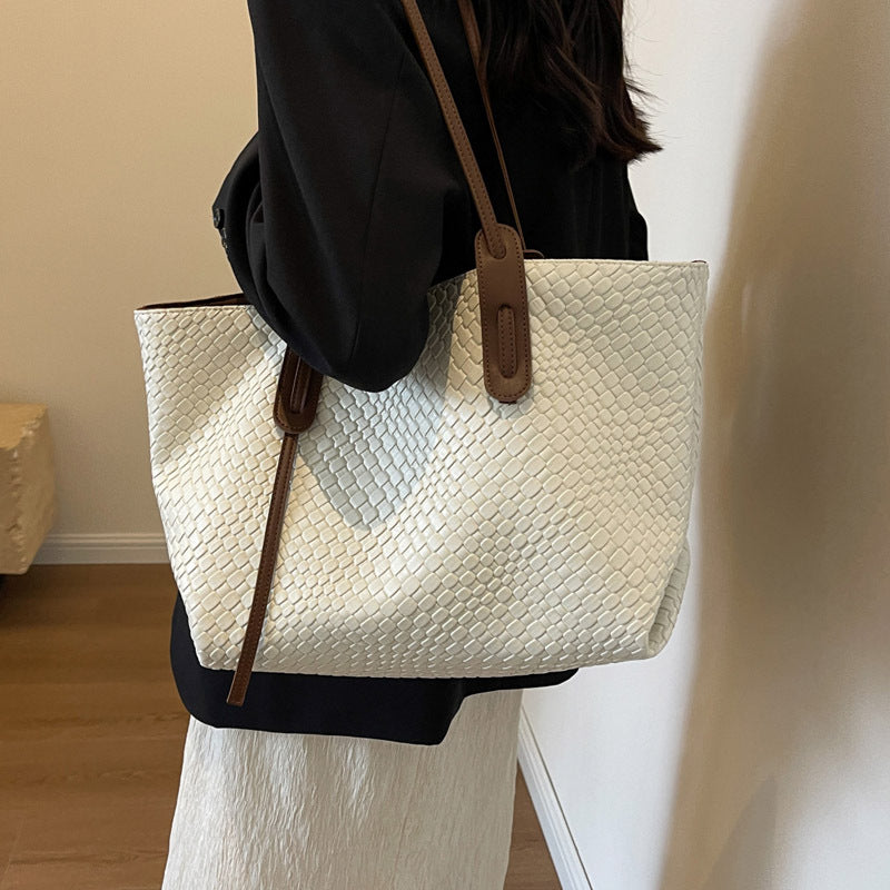 Woven PU tote bag in cream/ivory with brown top handles and shoulder strap