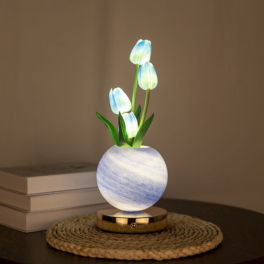 LED tulip night light with glowing pale blue tulips in gray-blue spherical pot