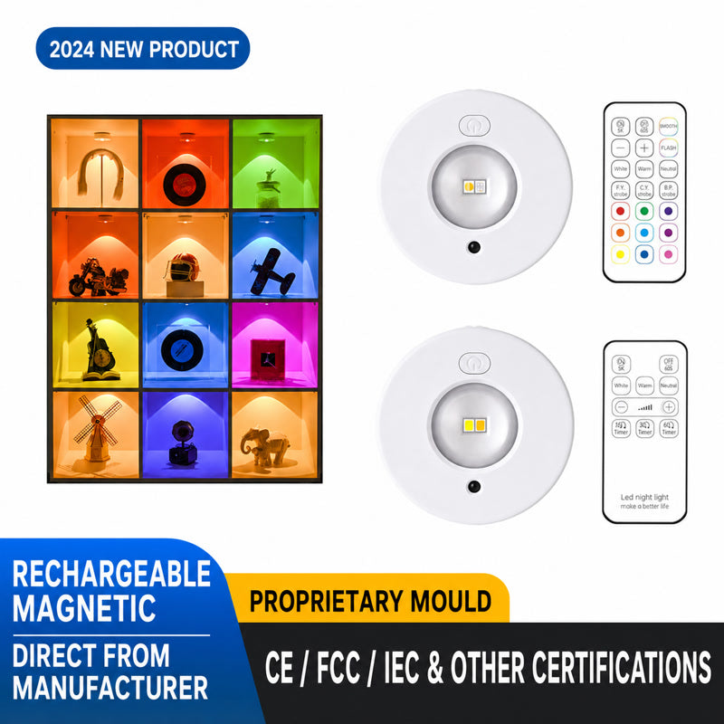 Two white round rechargeable magnetic RGB LED cabinet lights with remote