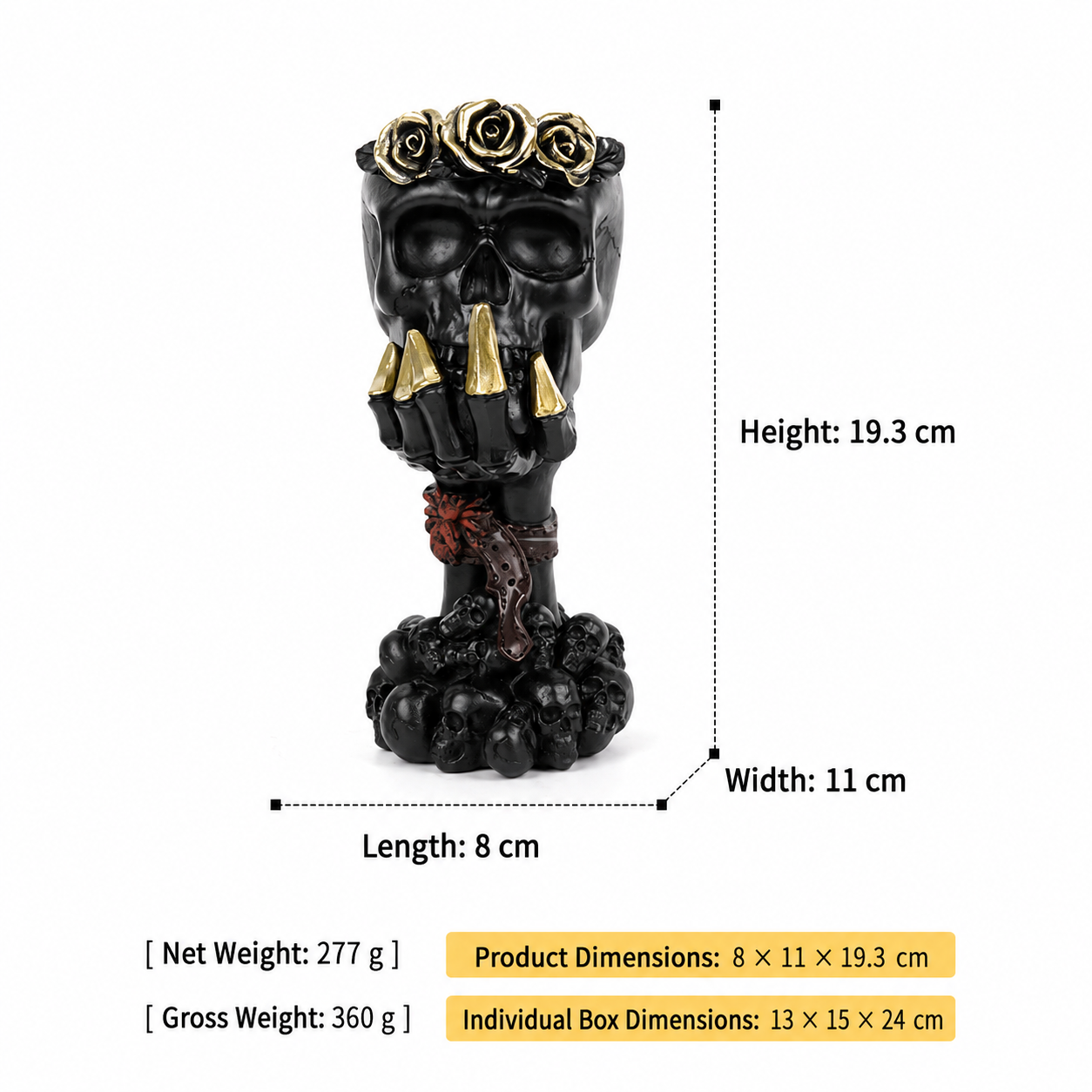 Black skull hand vase ornament with gold roses on top and small dark chain links