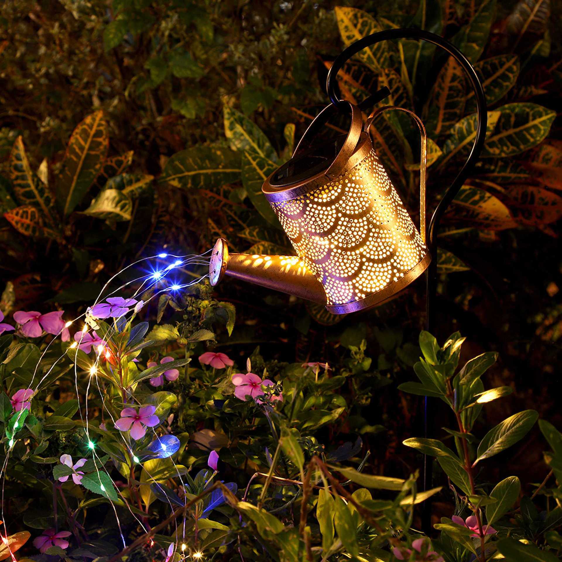 Solar projection lawn lamp with copper lantern and colorful blue-purple light strands