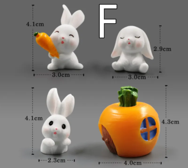 Mini resin rabbit figurines and orange house piece, including carrot-holding and sitting styles.