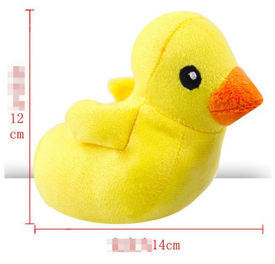 Yellow plush duck toy close-up with orange beak, textured fabric, on white