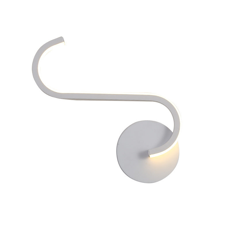 White LED wall lamp with curved tubular light and round backplate, soft glow.