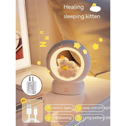 Blue moon night light lamp with sleeping kitten inside glowing ring on base