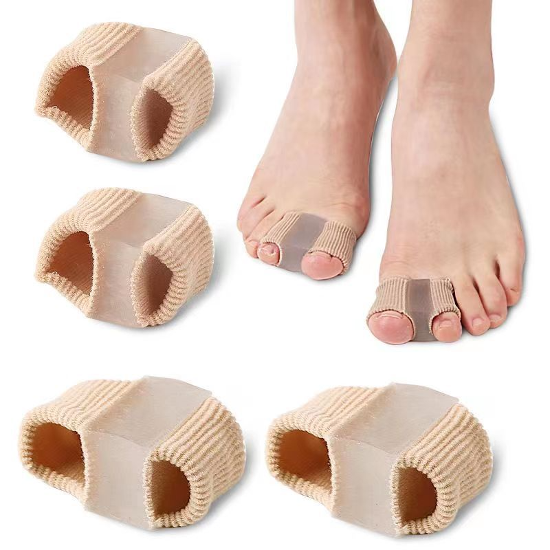 Toe separators on feet: soft beige knit two-opening sleeves for toe spacing and comfort