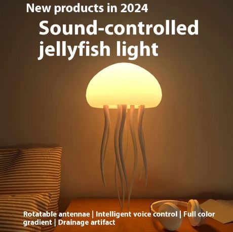 Jellyfish mood lamp with glowing silicone dome and dangling tentacles, on base