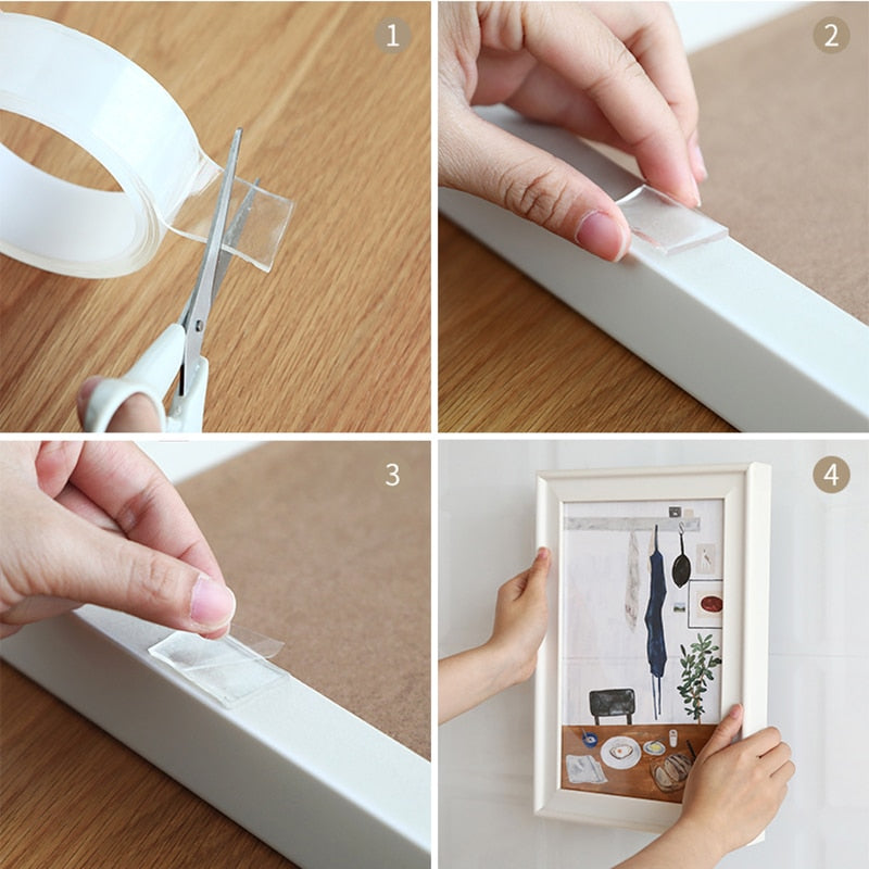 Clear double-sided tape strips being applied with scissors