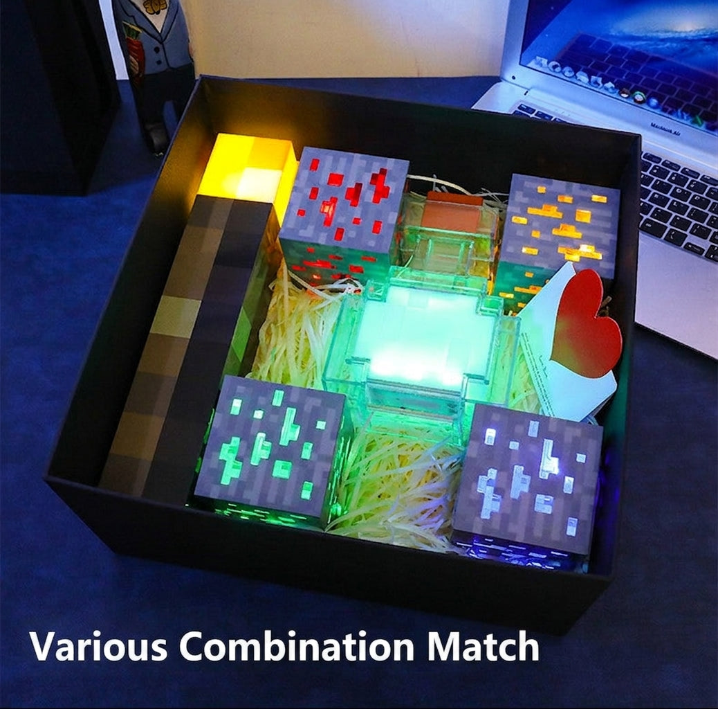 Boxed Minecraft LED color-changing night light set with glowing block lamps and torch