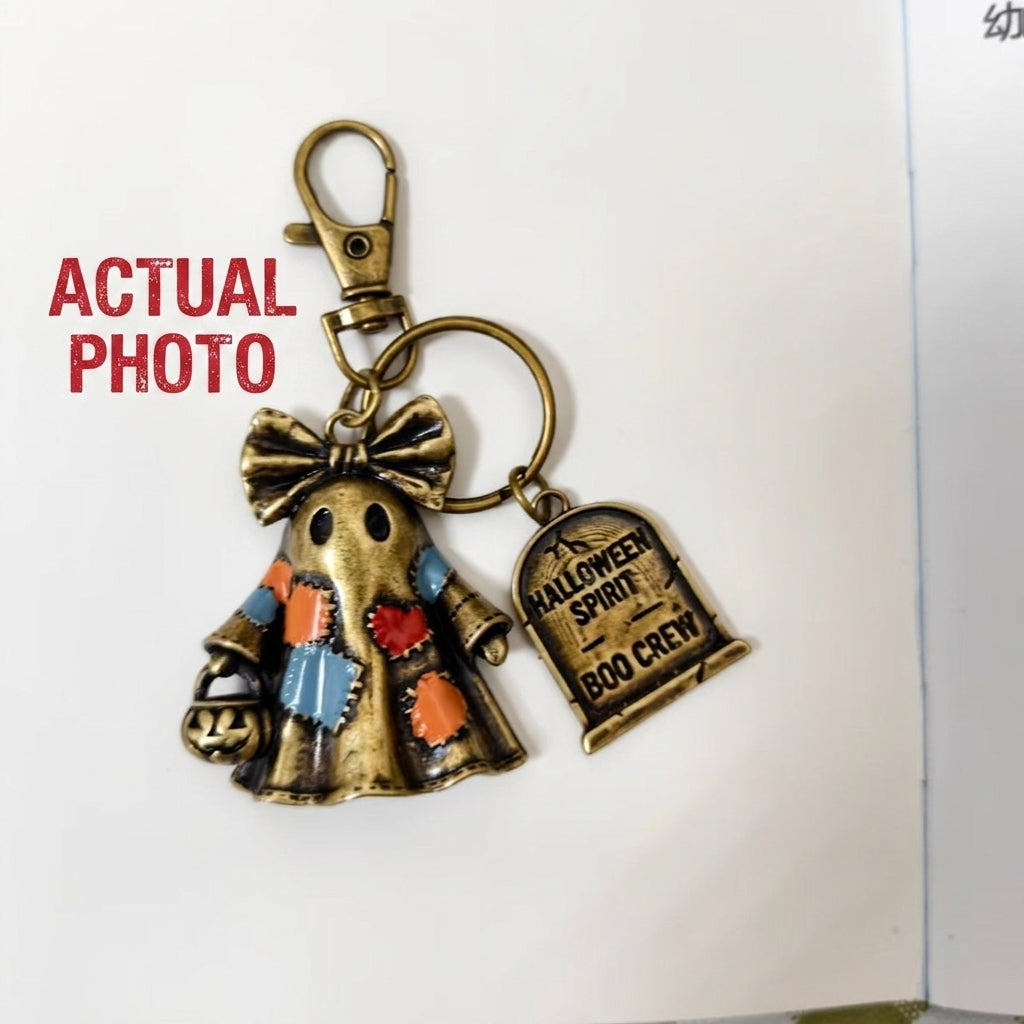 Halloween ghost keychain with bronze ring and Boo Crew tag, bow-topped ghost charm