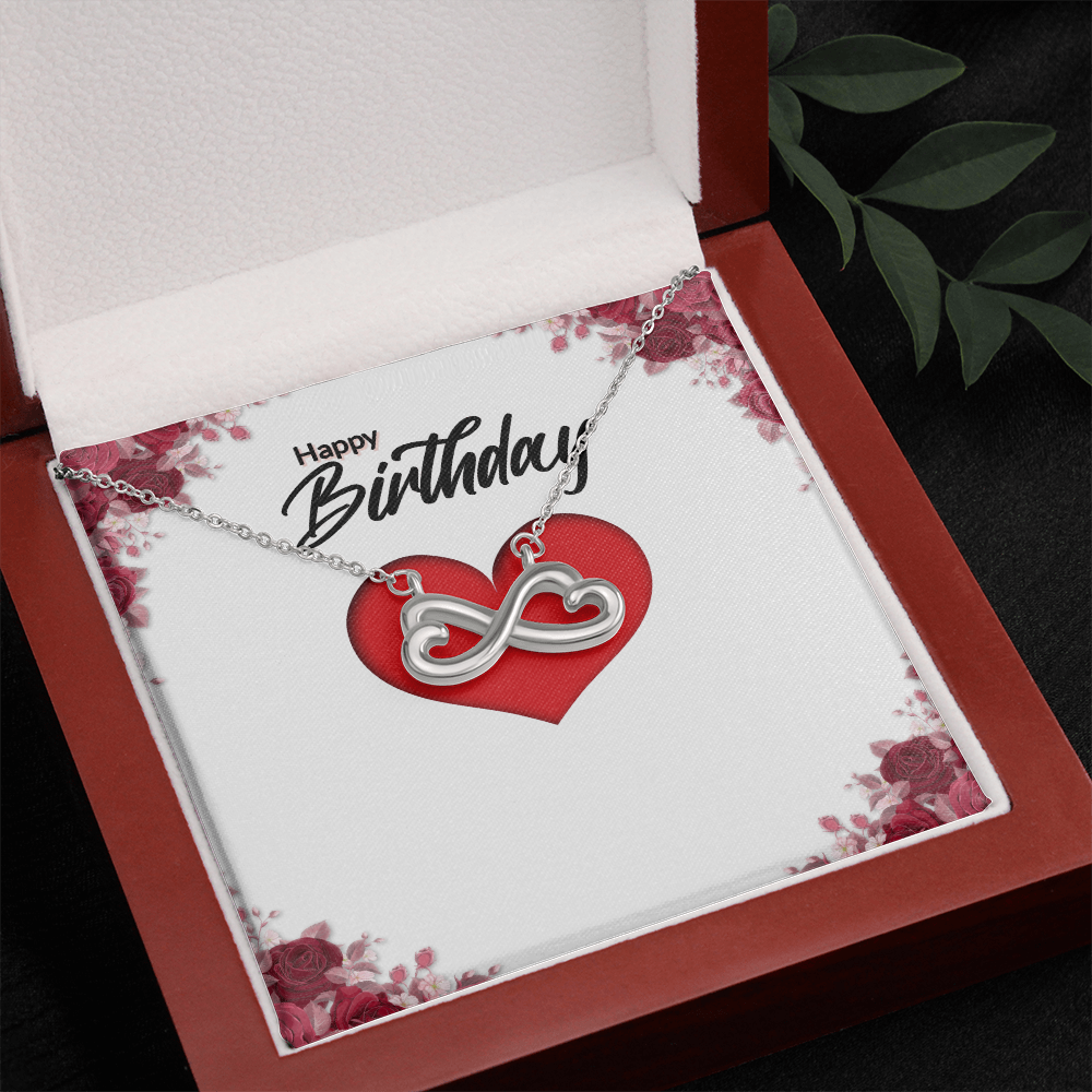 White gold infinity heart necklace with red heart pendant and cable chain
