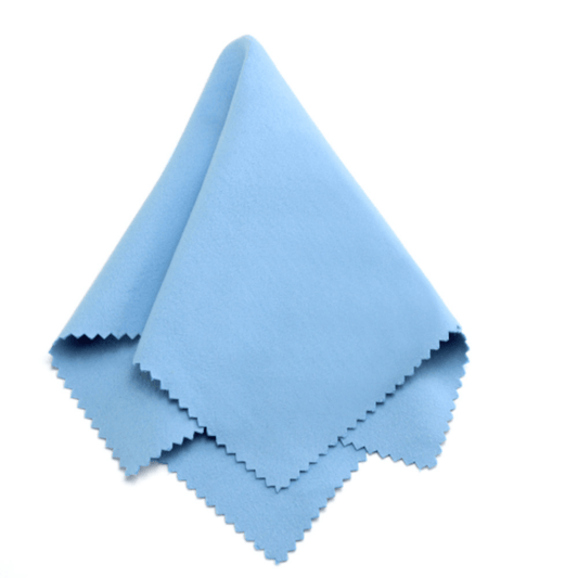 Blue jewellery polishing cloth, folded with serrated edges