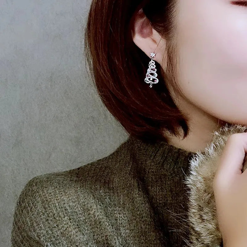 Silver-tone rhinestone Christmas tree drop earrings with star top and multicolor gems