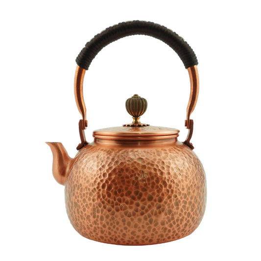 Handmade copper teapot with hammered texture, curved handle and lid knob, 600ml