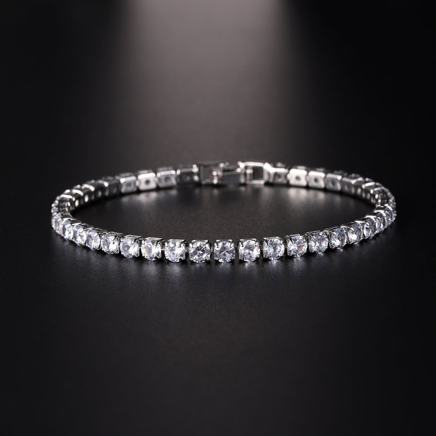 Silver tennis bracelet with clear micro zircon stones, side view