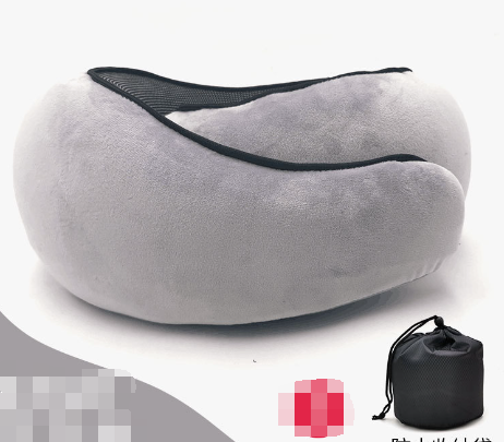 Light gray ergonomic travel neck pillow shown from side with contoured neck support