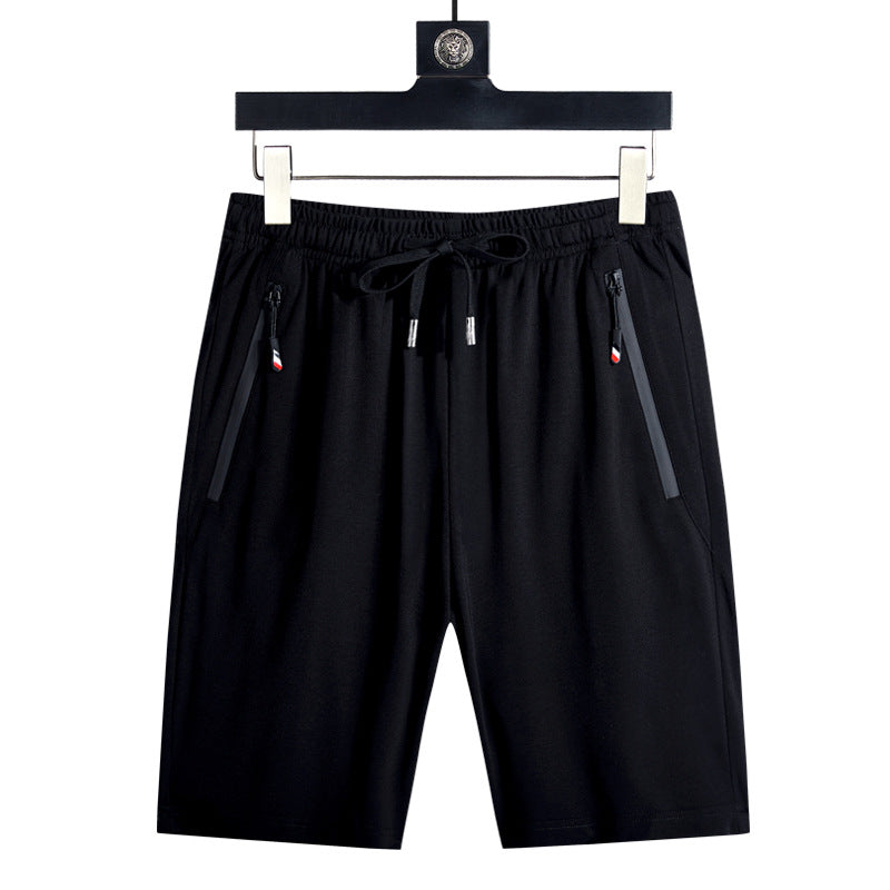 Black running beach shorts with elastic waist, drawstring, and zippered side pockets